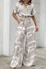 Irregular Print High Waist Side Pocket Button Tie Jumpsuit